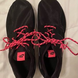 Black and pink Nikes